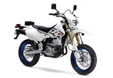 New 2017 SUZUKI DR-Z400SM SOLID SPECIAL WHITE Suzuki’s SuperMoto DR-Z400SM is based on the proven DR-Z400S so it combines Supermotard style and features in a narrow, lightweight street-legal package. This bike brings off-road soul and fun to paved roads. It’s not uncommon to take the SuperMoto down a twisty forest road, around tight canyon corners, or glide through commuter traffic. Its 398cc liquid-cooled, four-stroke engine provides strong low-rpm torque and crisp throttle response for any of these occasions. Key difference between the DR-Z400SM and the DR-Z400S are the inverted front fork, wide, spoke-style wheels, and 300mm diameter front brake disc. The inverted fork contributes to less unsprung weight and improved overall handling, while the large brake and wider rims with high-grip tires offer an exhilarating sportbike experience.